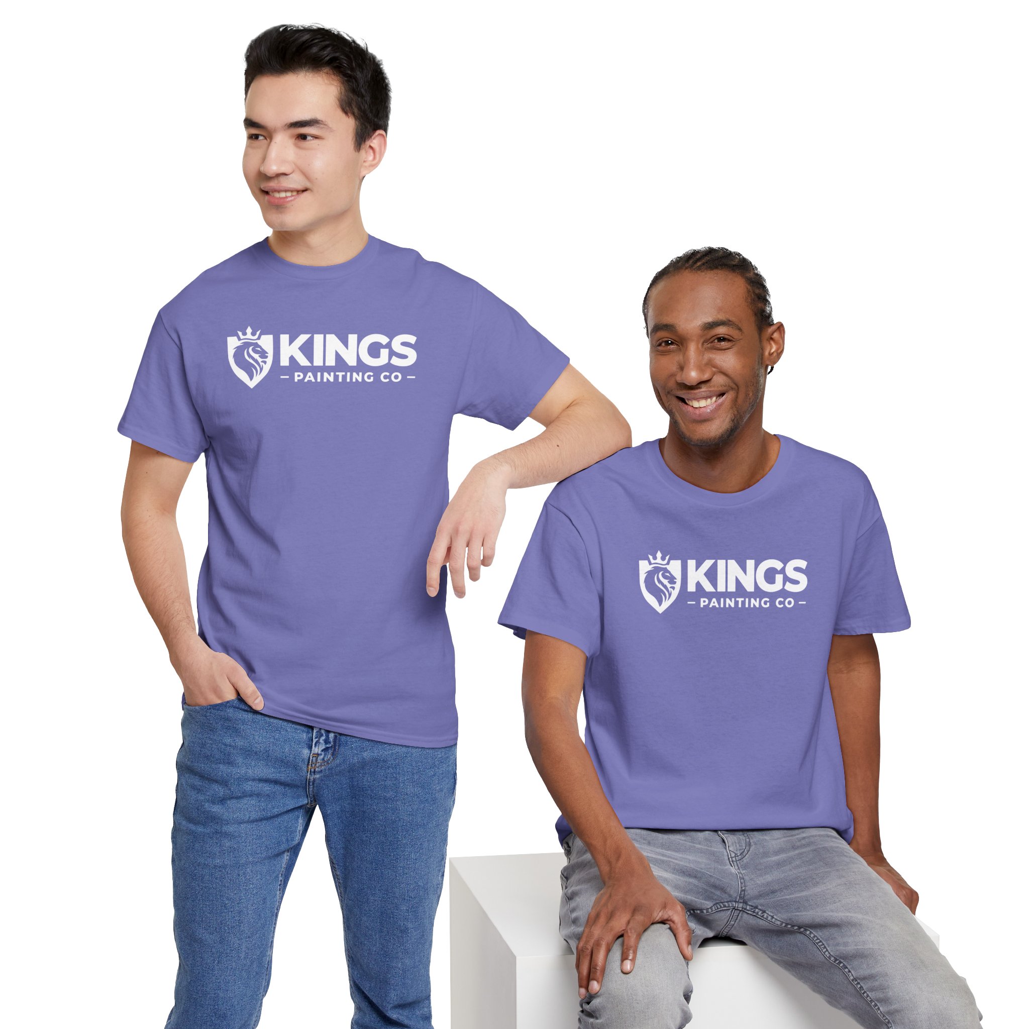 Two men pose together against a plain white background, both smiling and wearing Kings Painting Co. Logo T‑Shirts (Classic) on Gildan Ultra Cotton (G5000); one stands with his hand in his pocket while the other sits on a white block.