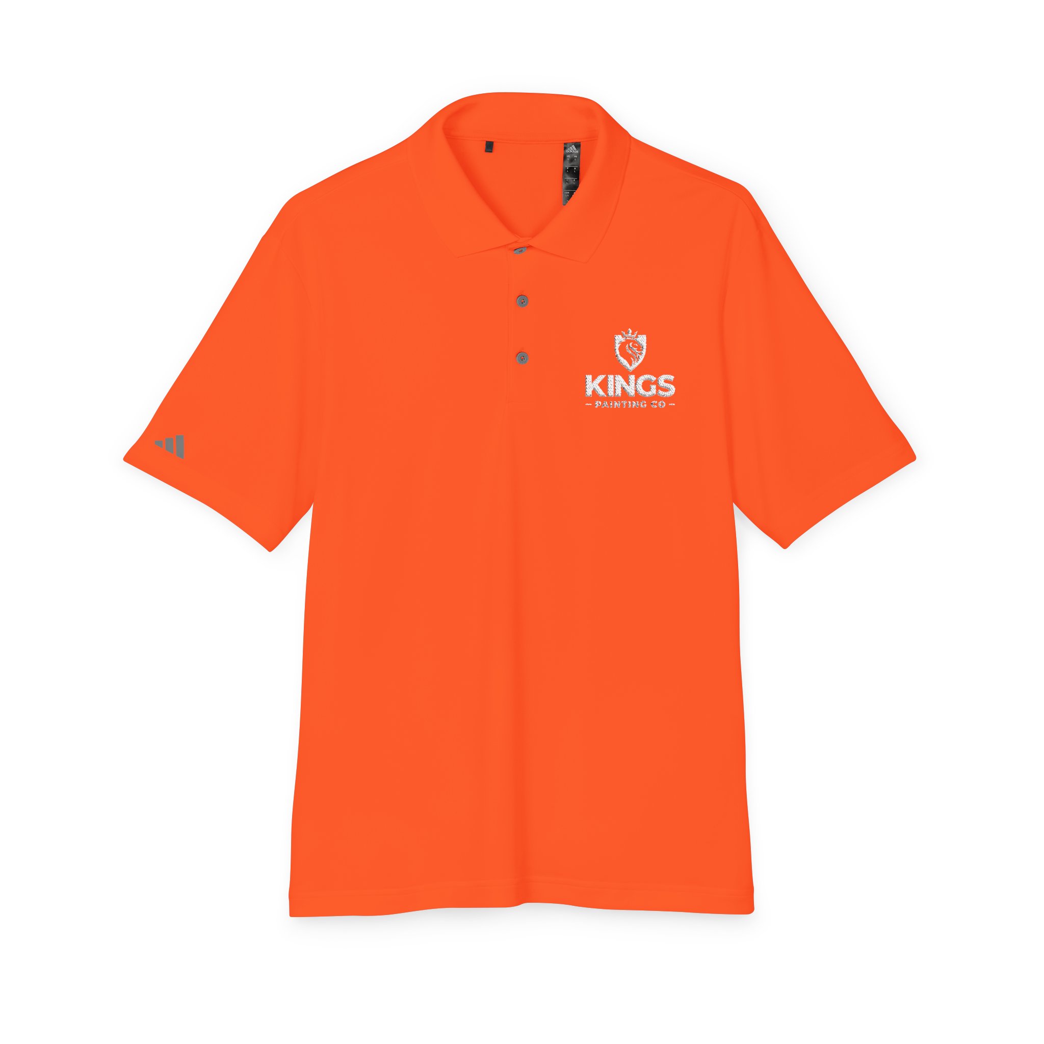 Kings Painting Co. Performance Polo by Under Armour®, featuring a bright orange color, three-button placket, KINGS PAINTING CO. 2023 logo and lion graphic on the left chest, and a small white Under Armour® logo on the left sleeve. The shirt is displayed laid flat on a white background.